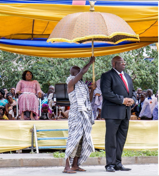 Dele Momodu under umbrella