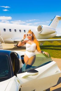 Ashley Stephanie teases fans with stunning photos from “TOMBER” music video shoot