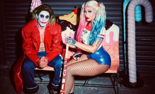 Nicki Minaj and Husband seated.