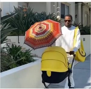 Singer, D’banj steps out with new born son (photos)