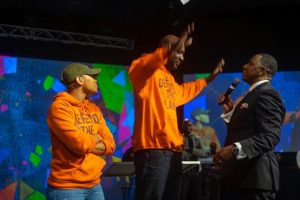 Lamar Odom with hands raised in surrender