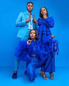 Two ladies on royal blue