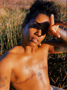 Akwaeke Emezie goes topless to reveal mastectomy scar after breast removal surgery