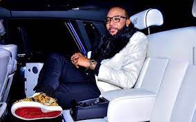 E-Money gifts comedians, staff members cars on birthday